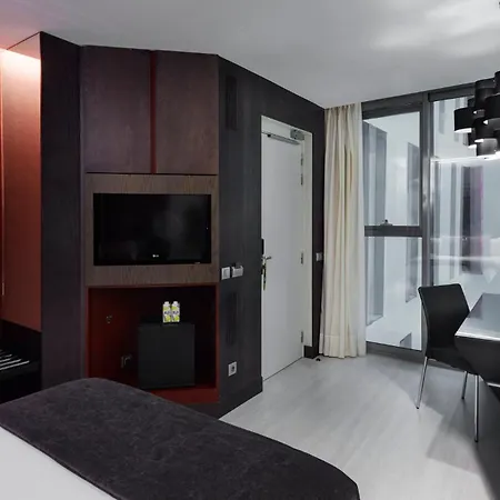 Sercotel Rosellon Отель